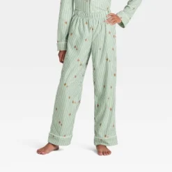 Kids' Gingerbread Striped Long Sleeve Shirt And Pants Holiday Matching Family Pajama Set - Wondershop™ Cream -Christmas Lights GUEST ba62f861 f58b 4f8e a1f6 7cb8b32c6d18